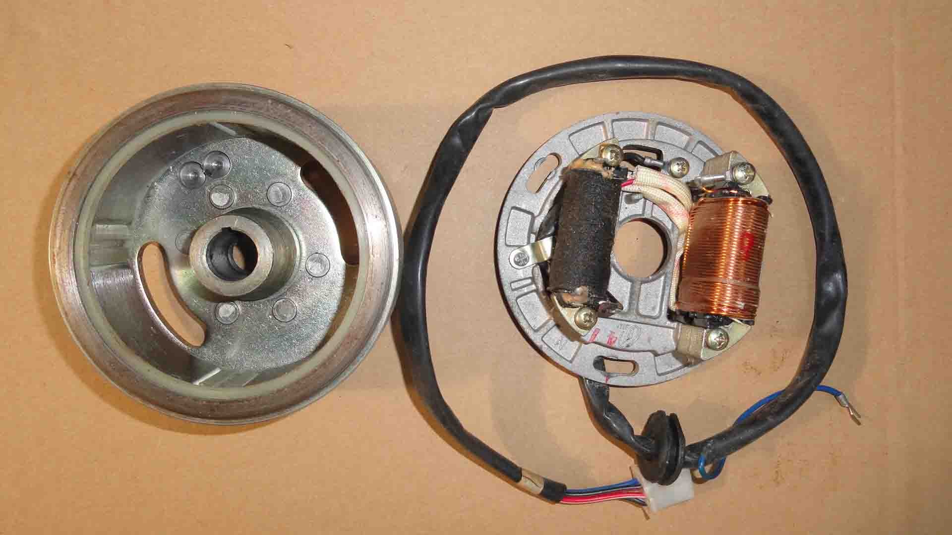 MONTAJE DEL MAGNETO DEL MOTOR DE SUZUKI AX100